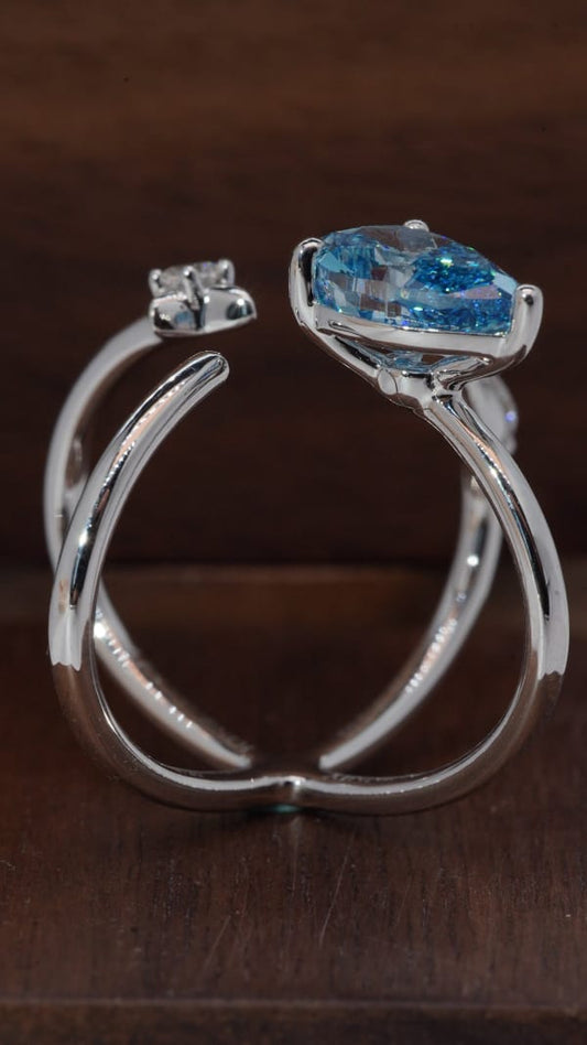 "Ocean Drop" X-Cross Blue Topaz Ring