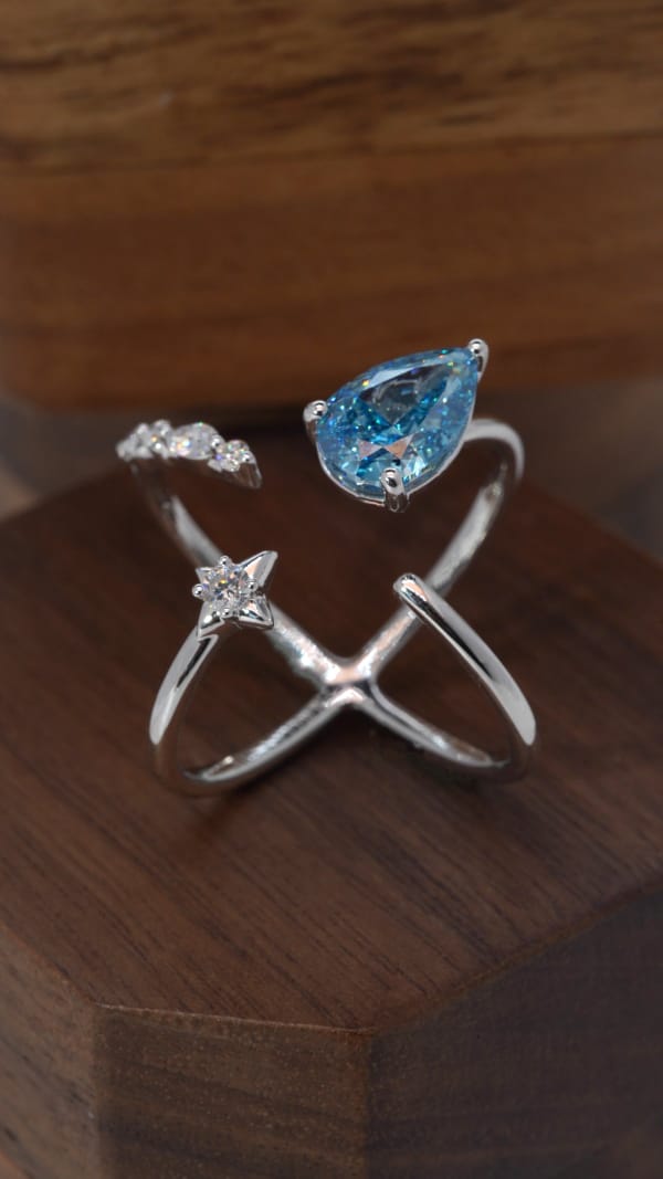 "Ocean Drop" X-Cross Blue Topaz Ring
